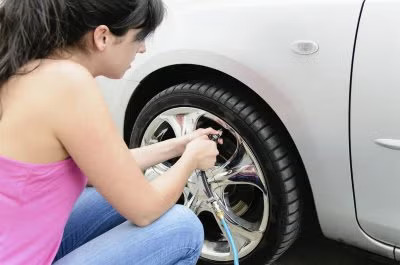 Women filling air in tires