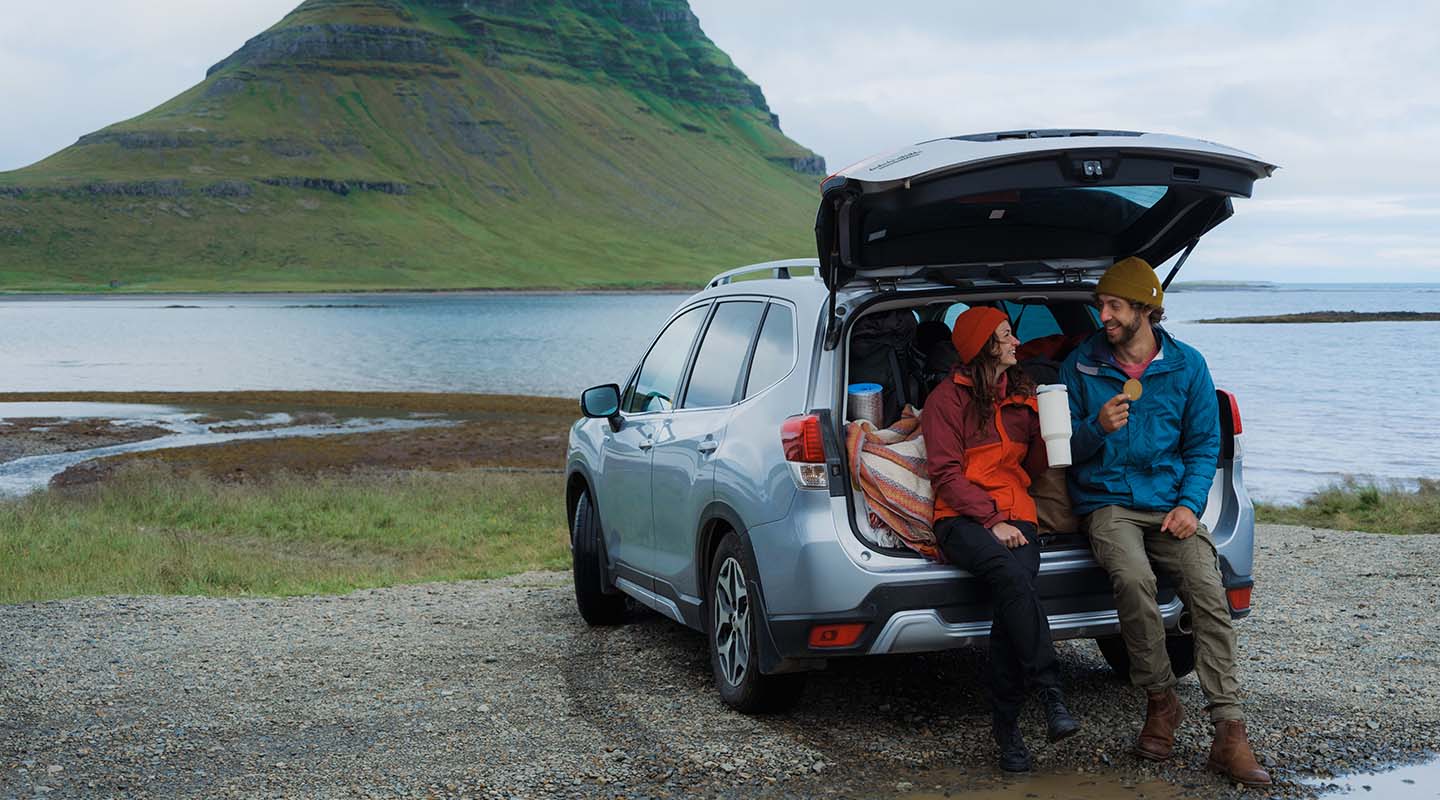 Woman and man resting during road trip