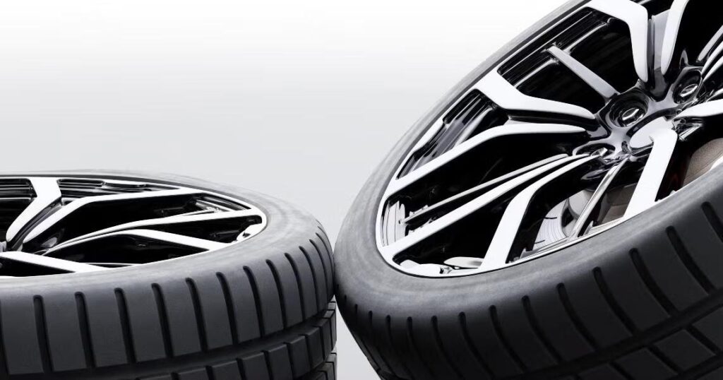 Two tires displayed on a white background, showcasing their design and texture.